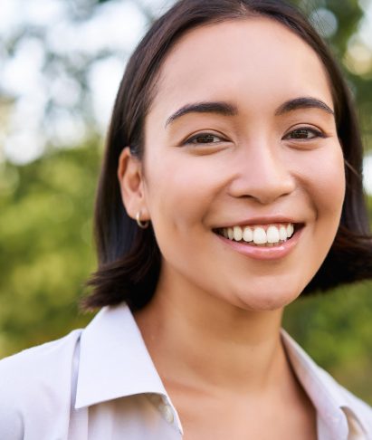 close-up-face-of-asian-happy-girl-smiling-and-loo-2025-03-08-00-11-13-utc.jpg